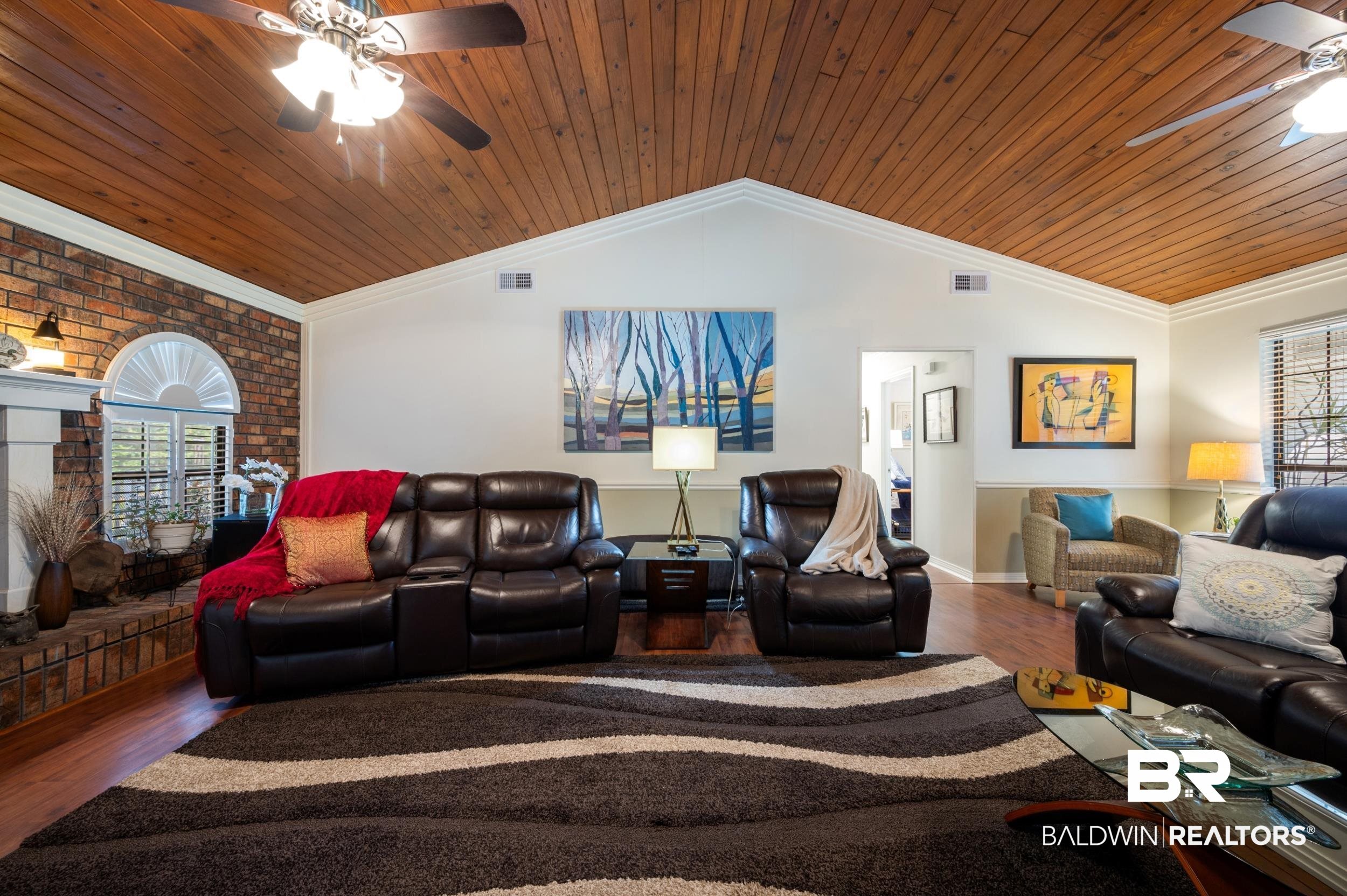 550 Norwood Road Monroeville, AL 36460 - Photo 9 of 46 Living room with a ceiling fan, wood finished floors, crown molding, and wood ceiling