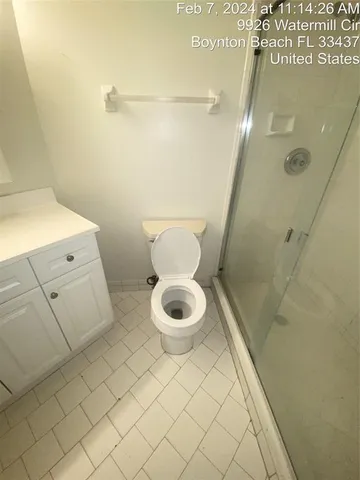 a close view of a sink and cabinets