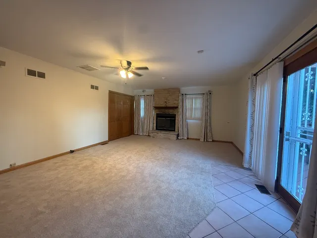 a view of a livingroom with a fireplace