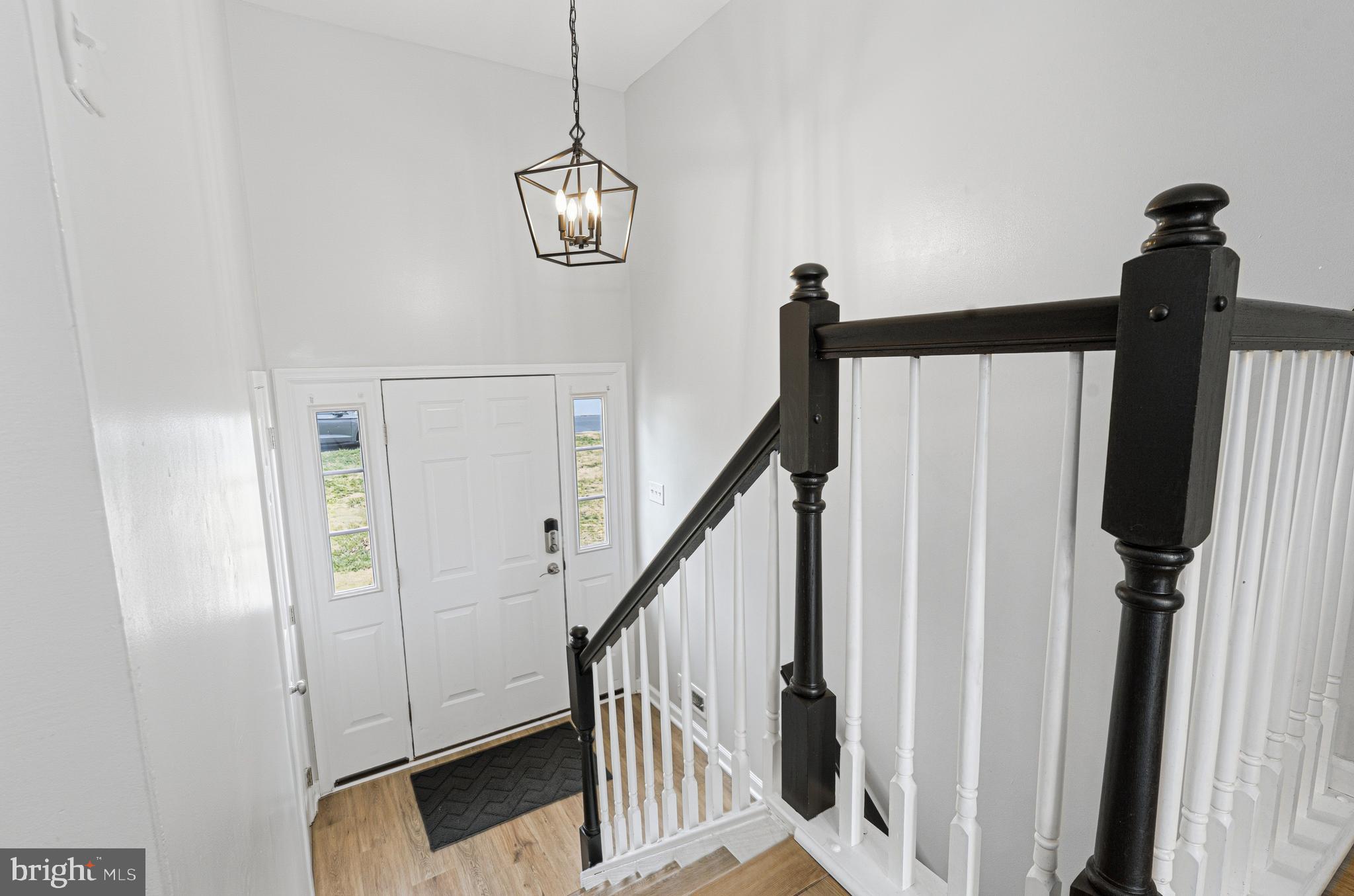 243 9th Street Pasadena, MD 21122 - Photo 19 of 41 a view of a hallway with the entryway