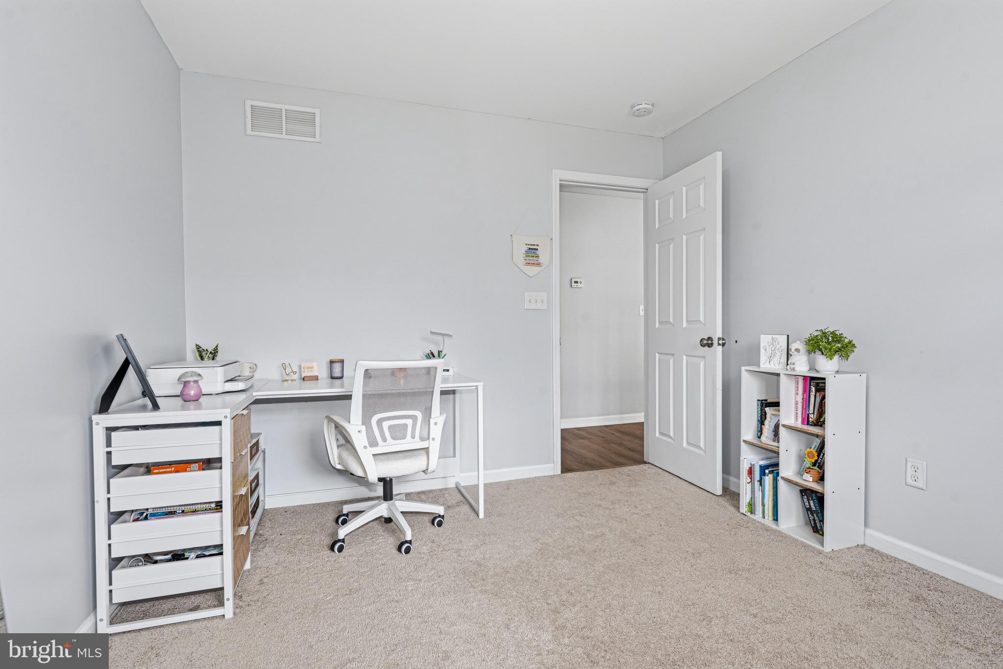 243 9th Street Pasadena, MD 21122 - Photo 25 of 41 a view of a workspace with furniture
