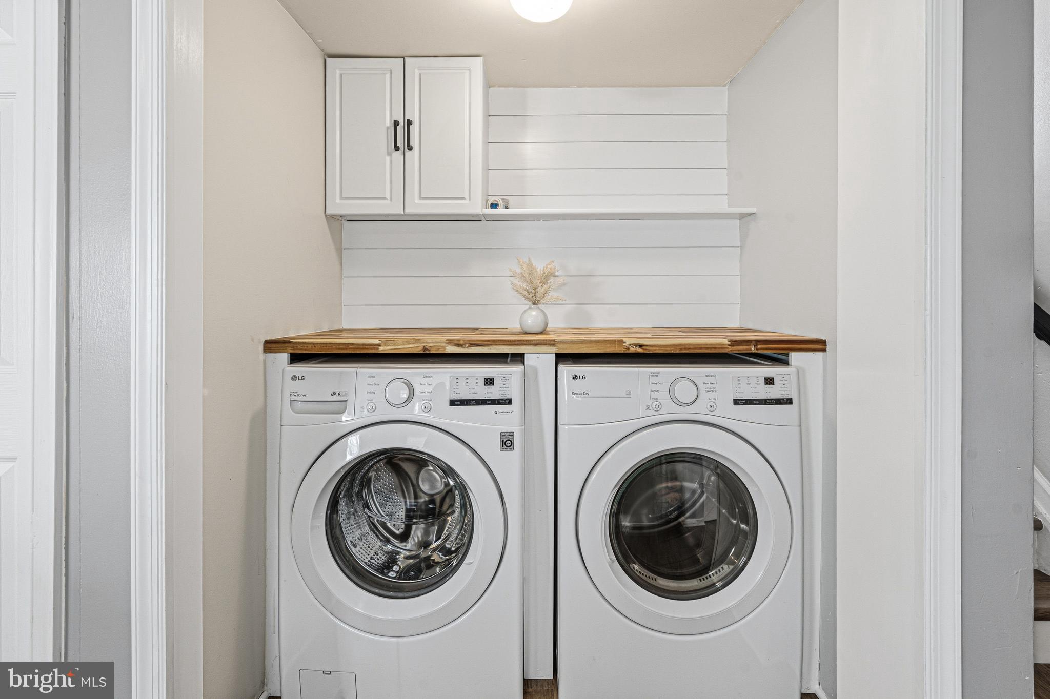 243 9th Street Pasadena, MD 21122 - Photo 29 of 41 a utility room with dryer and washer