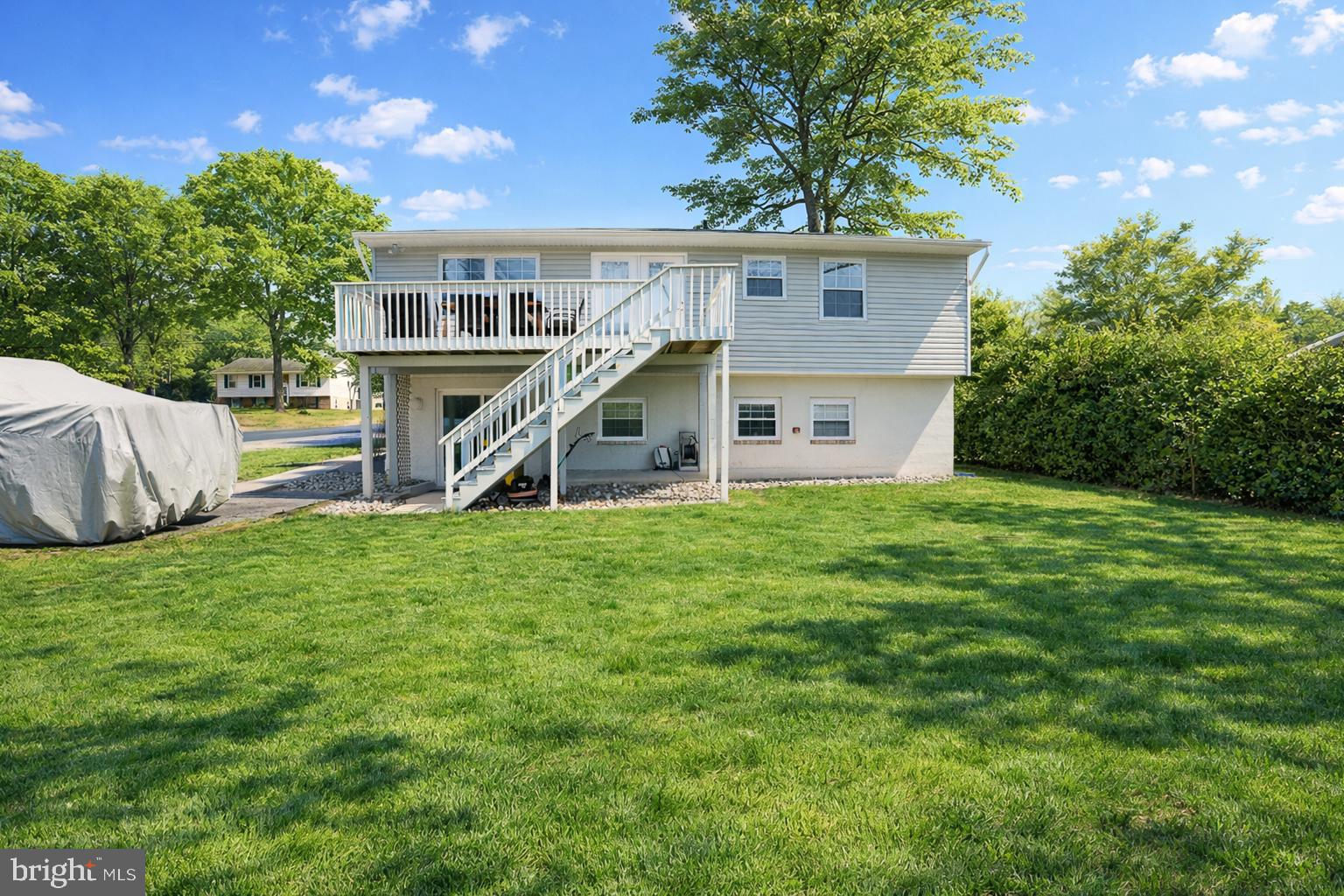 243 9th Street Pasadena, MD 21122 - Photo 3 of 41 a house view with a garden space