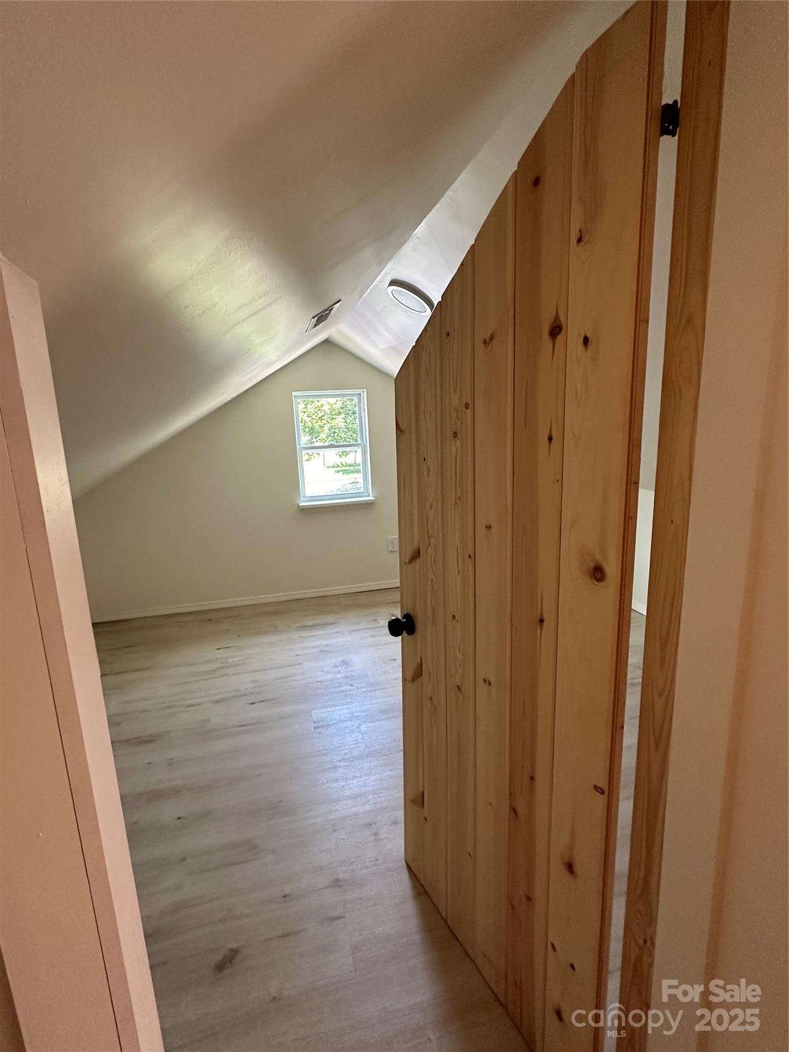 1409 Enochville Road Kannapolis, NC 28081 - Photo 11 of 14 a view of a hallway with wooden floor and closet area