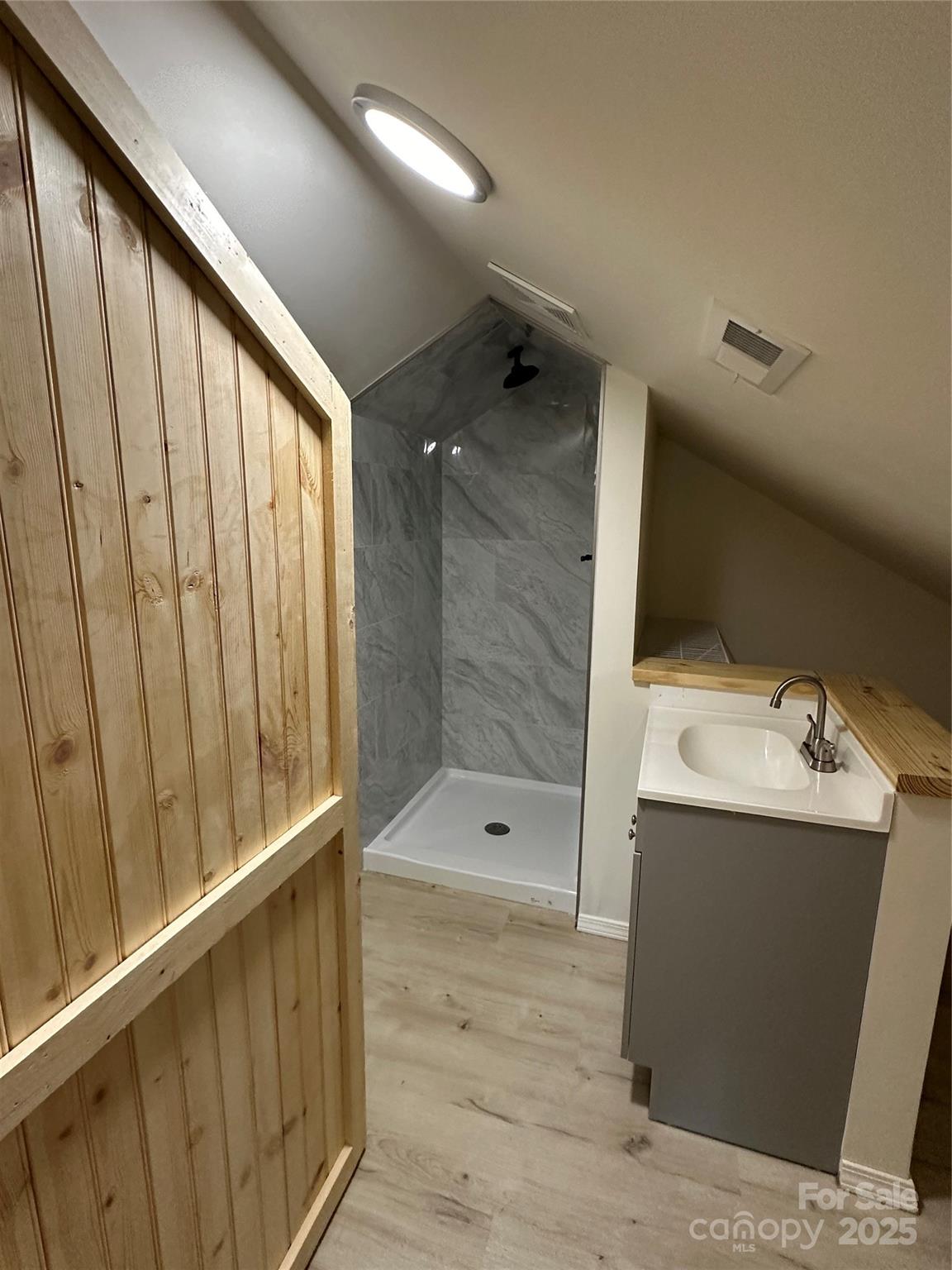 1409 Enochville Road Kannapolis, NC 28081 - Photo 12 of 14 a bathroom with a shower and sink