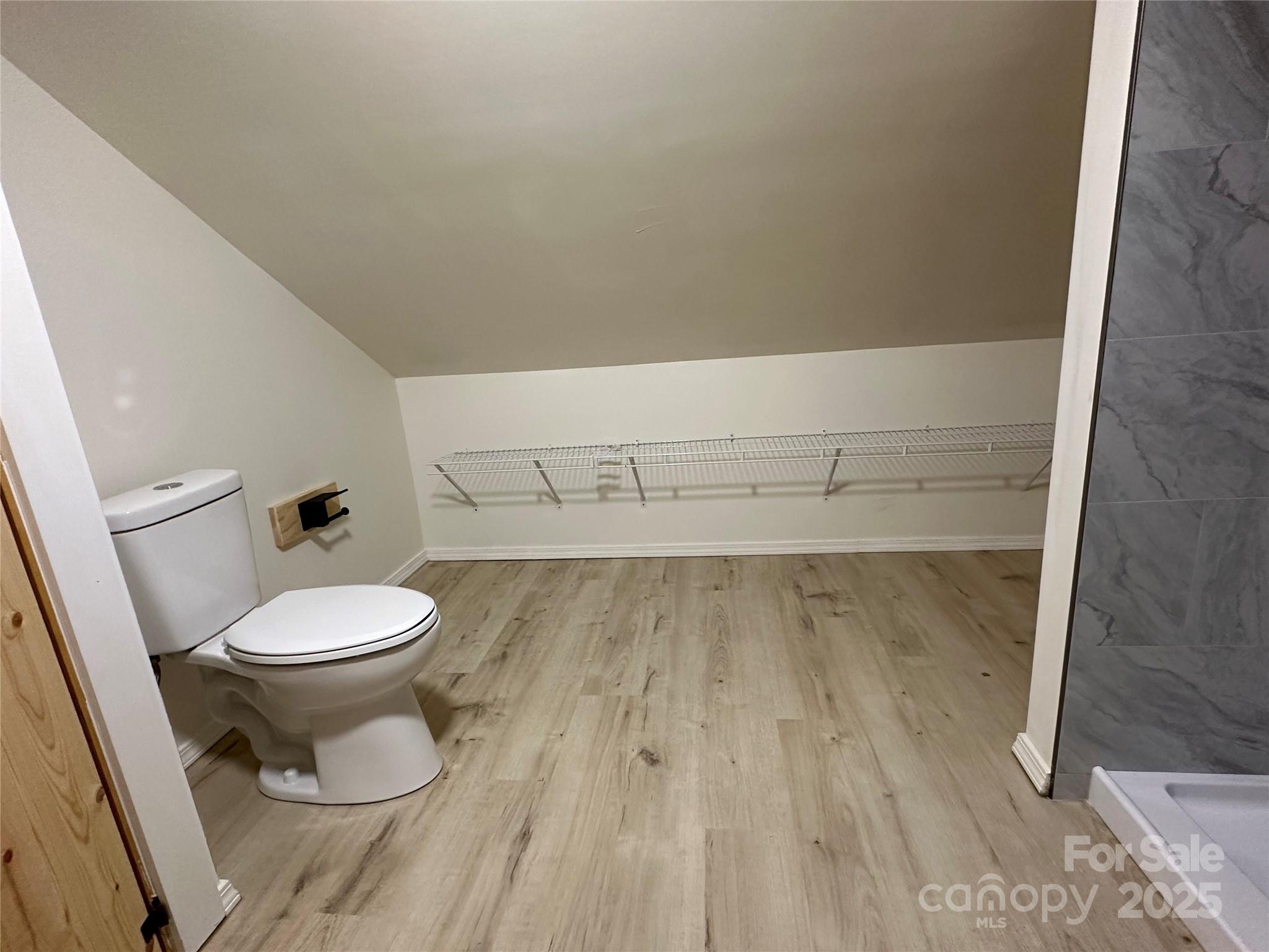 1409 Enochville Road Kannapolis, NC 28081 - Photo 13 of 14 a bathroom with a toilet and a shower