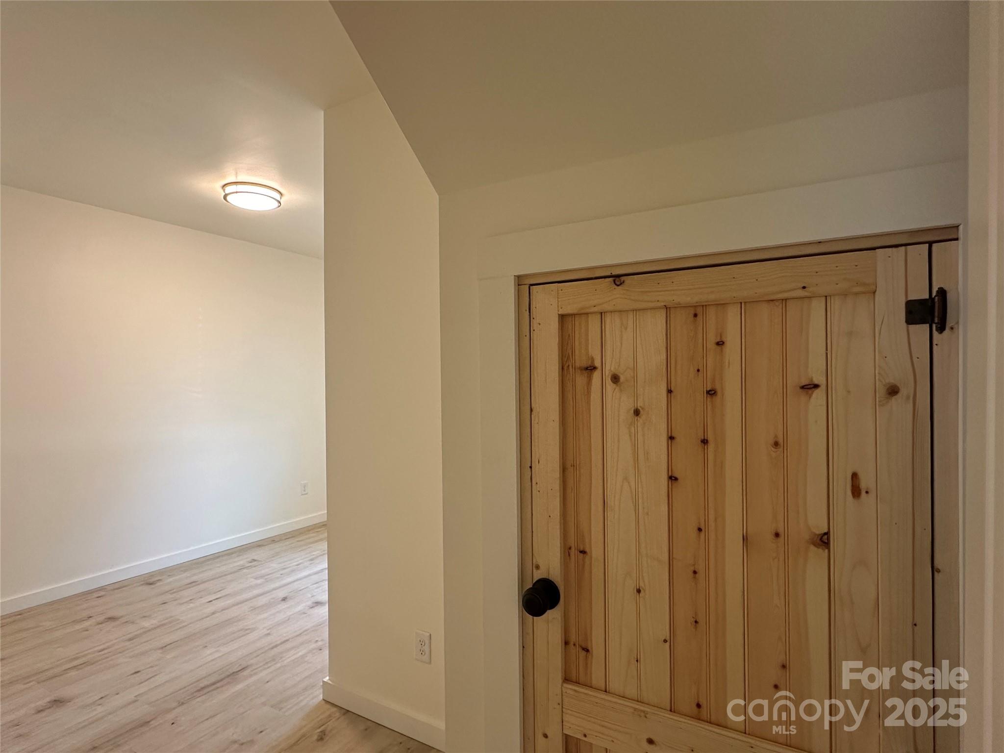 1409 Enochville Road Kannapolis, NC 28081 - Photo 4 of 14 a view of a bathroom with wooden floor