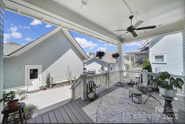 a view of a living room and a wooden floor