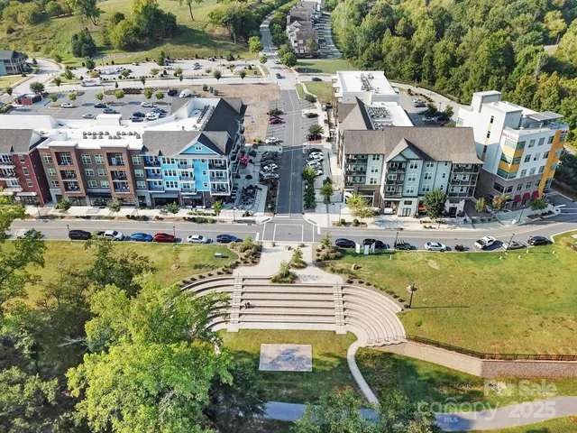 a view of a swimming pool with a yard