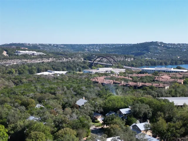 an aerial view of residential building and green space