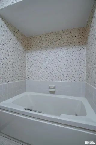 a bathroom with a bathtub