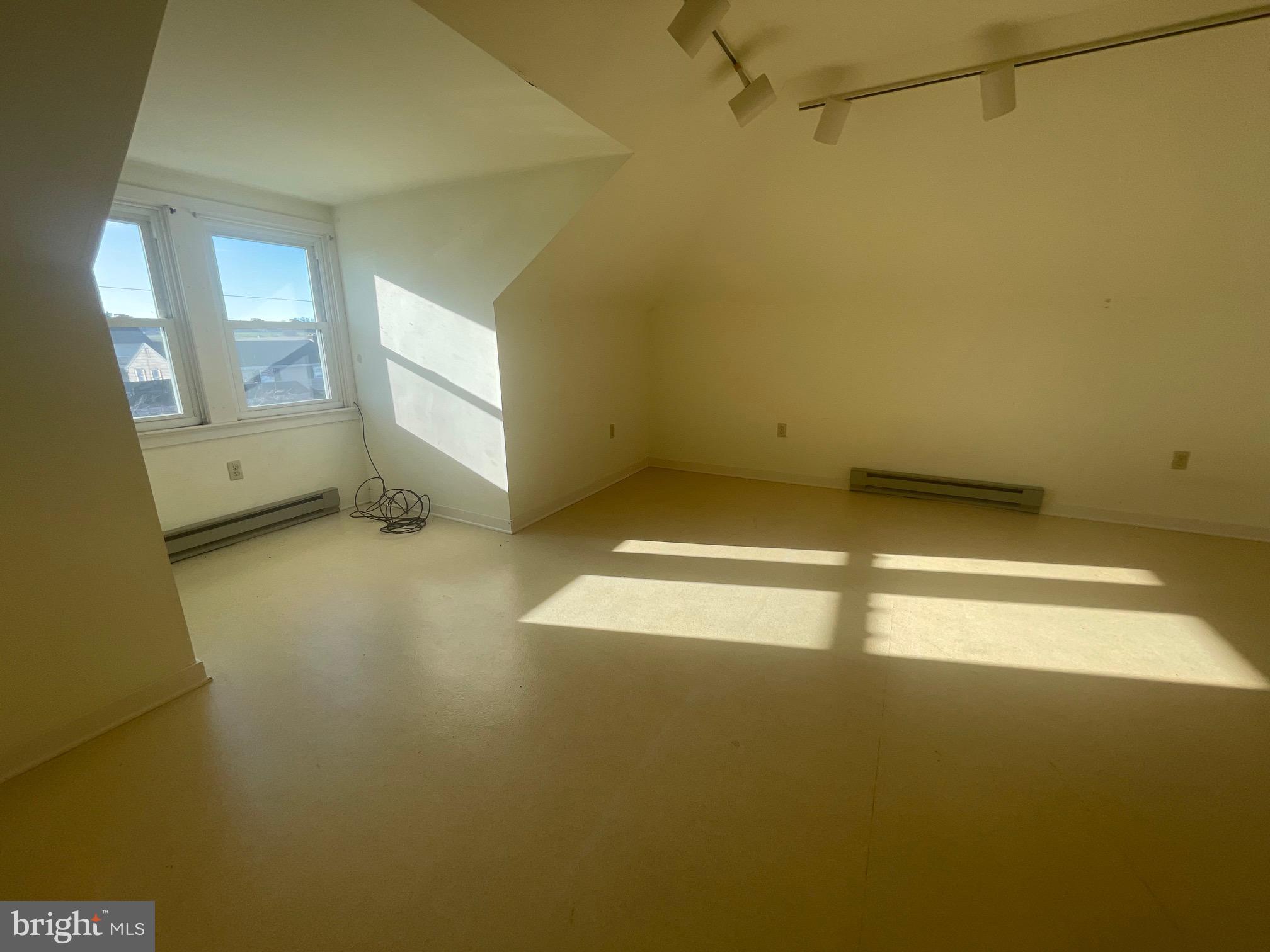 219 Herr Road Ronks, PA 17572 - Photo 15 of 25 an empty room with a empty space and windows