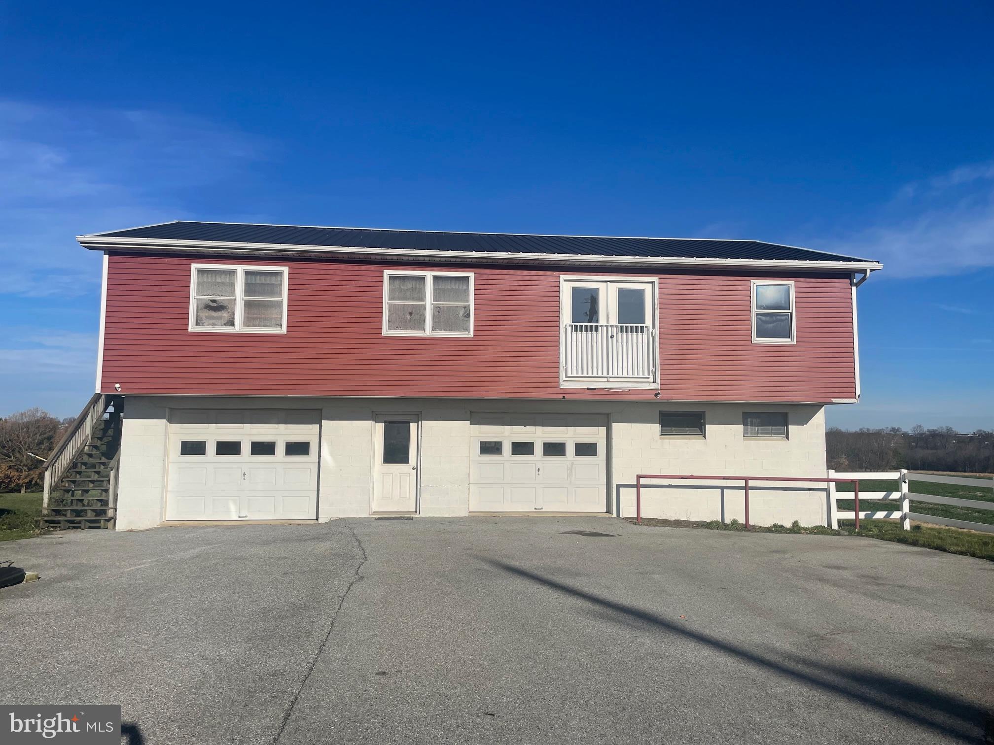 219 Herr Road Ronks, PA 17572 - Photo 23 of 25 a front view of a house with a yard
