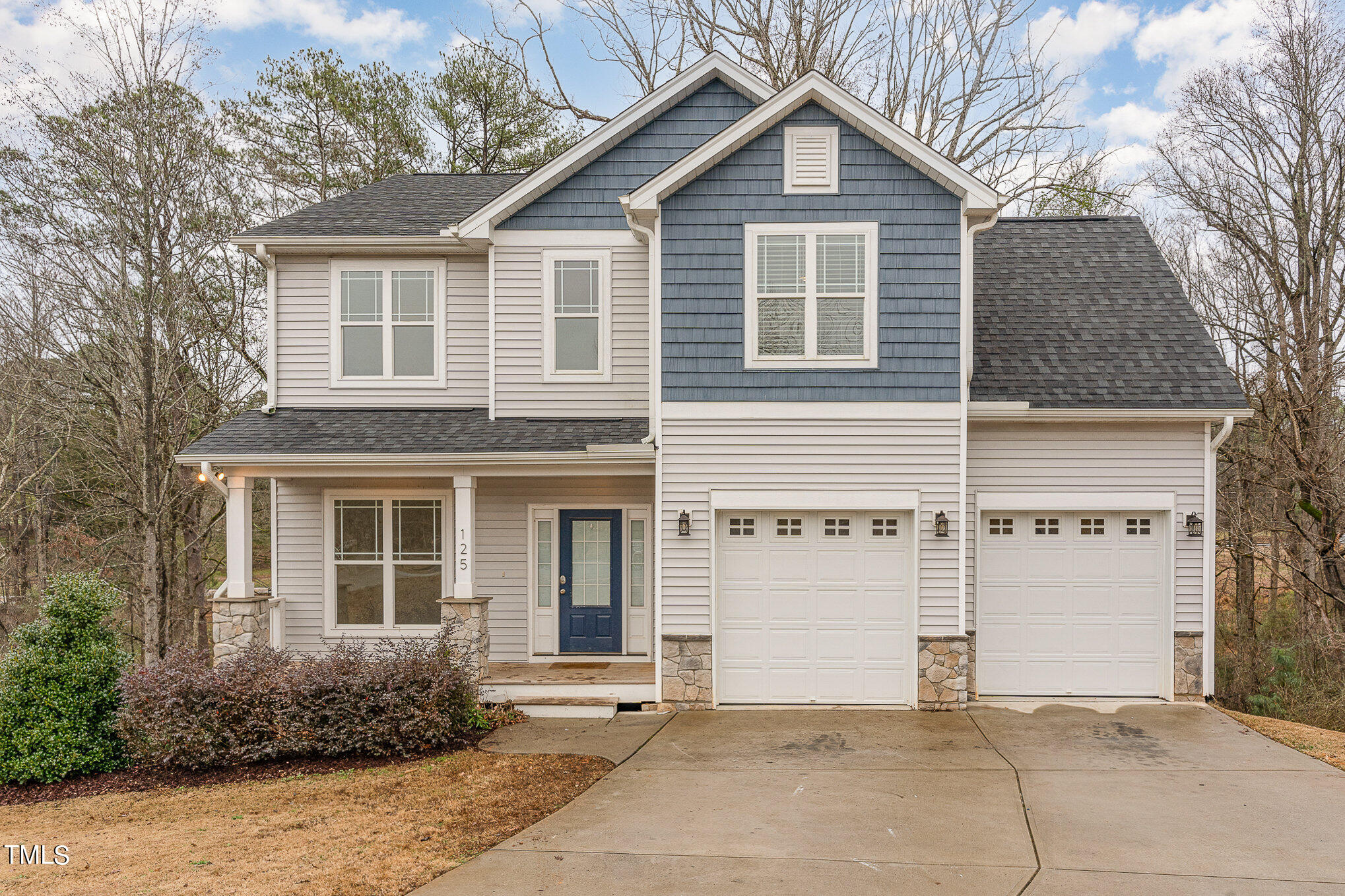125 Holyoke Court Raleigh, NC 27603 - Photo 1 of 30 a view of a house with a yard and plants