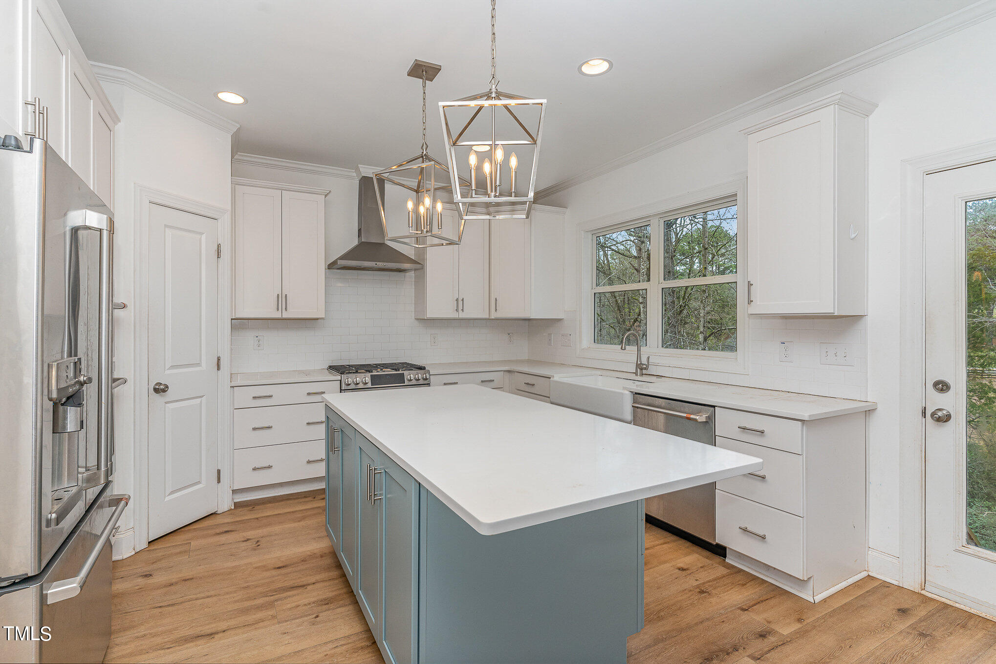 125 Holyoke Court Raleigh, NC 27603 - Photo 12 of 30 a kitchen with a stove a sink and a window