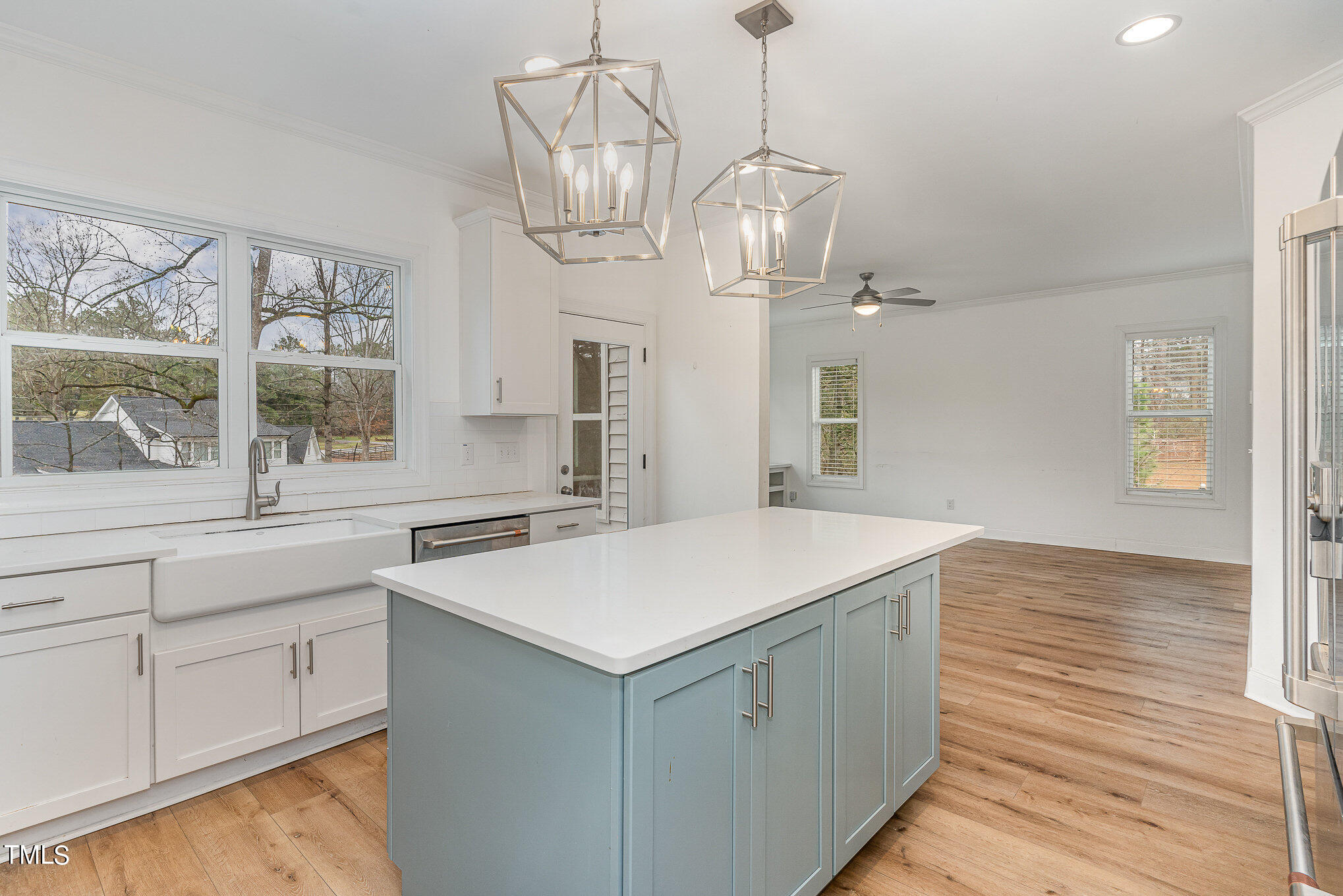 125 Holyoke Court Raleigh, NC 27603 - Photo 14 of 30 a view of a kitchen counter space a sink and wooden floor