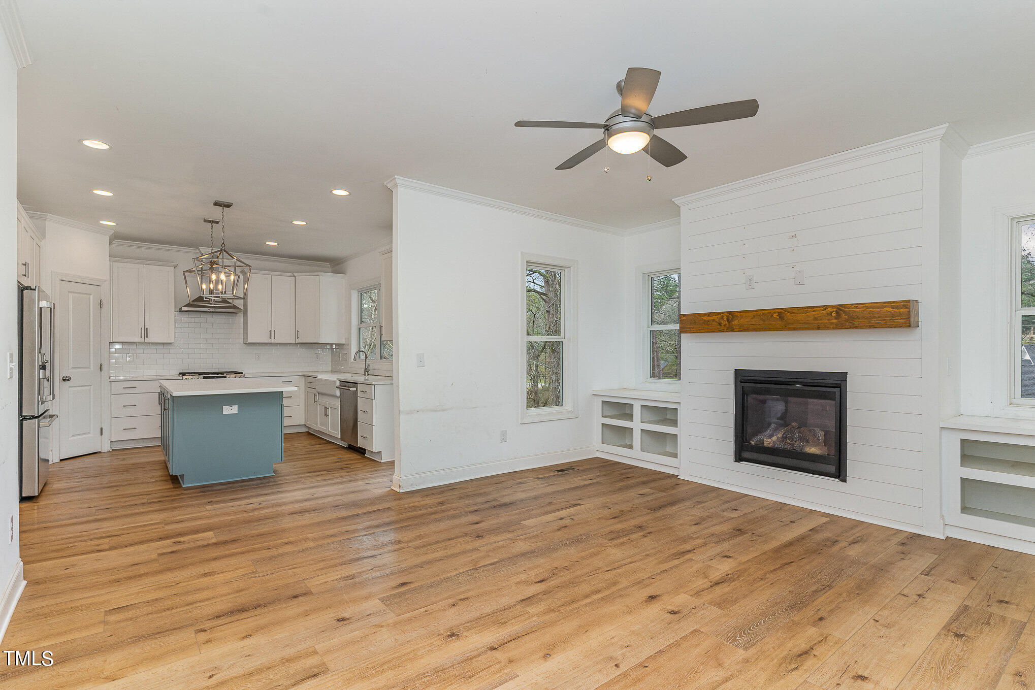 125 Holyoke Court Raleigh, NC 27603 - Photo 10 of 30 a view of a kitchen and a fireplace