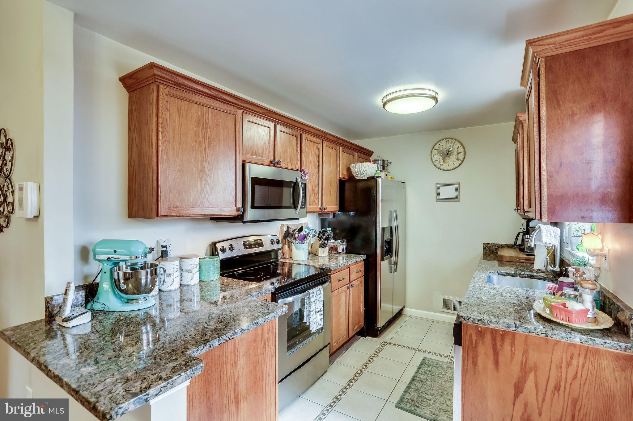 7811 Fordson Road Alexandria, VA 22306 - Photo 15 of 51 Kitchen with stainless steel appliances