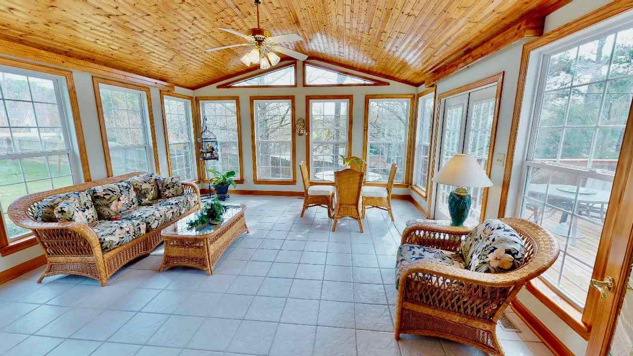 7504 Boscobel Way Raleigh, NC 27615 - Photo 14 of 25 Huge sunroom with gorgeous wood ceiling and molding! Sunroom