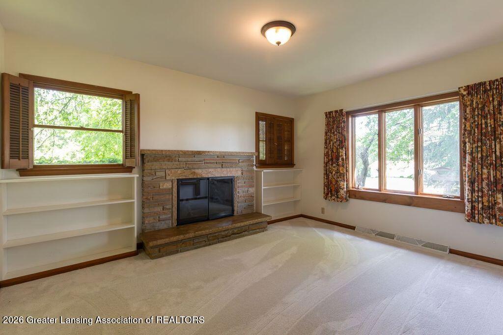 3181 Moyer Road Williamston, MI 48895 - Photo 15 of 27 Den/Library Fireplace