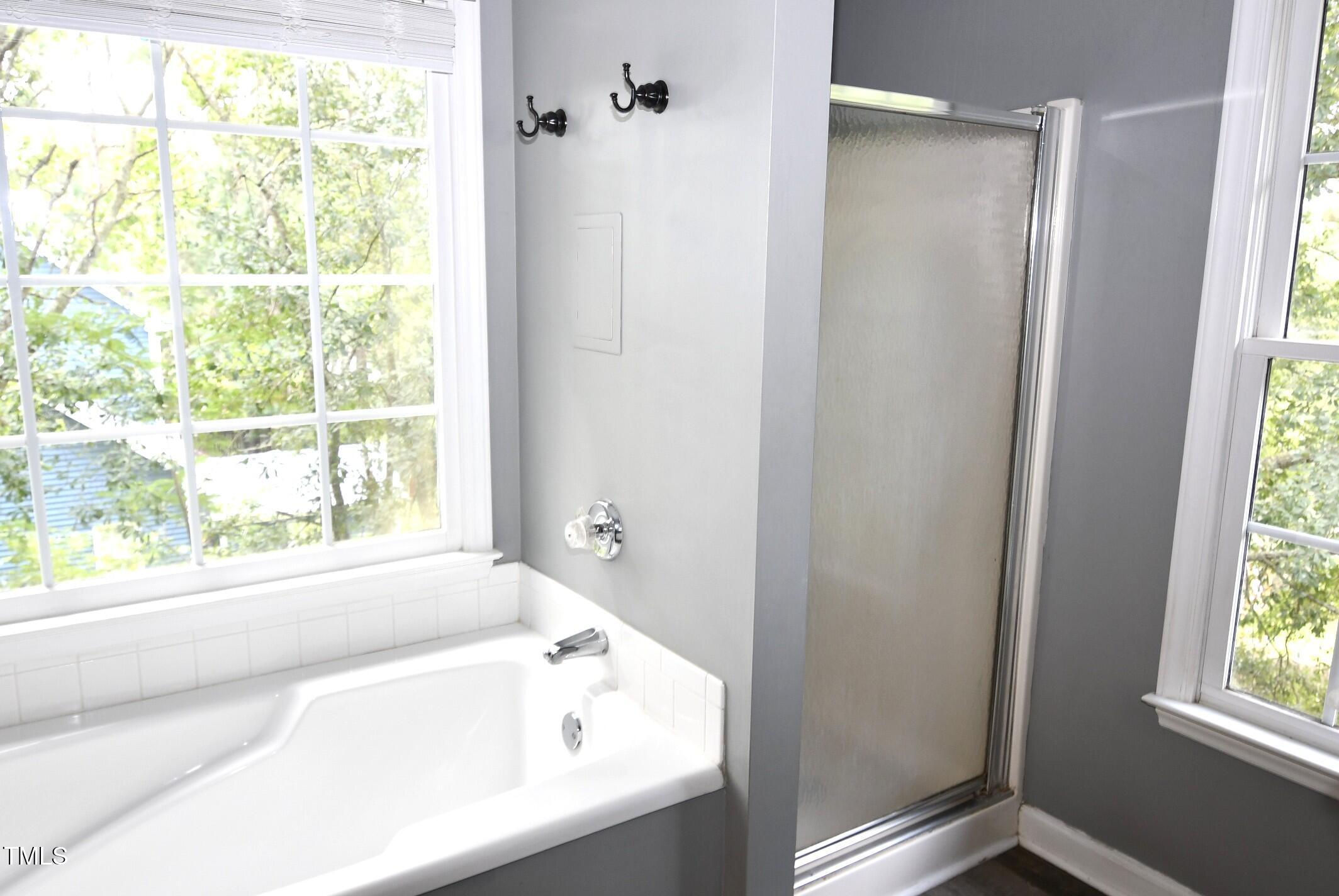 3209 Leebrook Road Raleigh, NC 27616 - Photo 17 of 30 Primary Bath with Tub and Shower