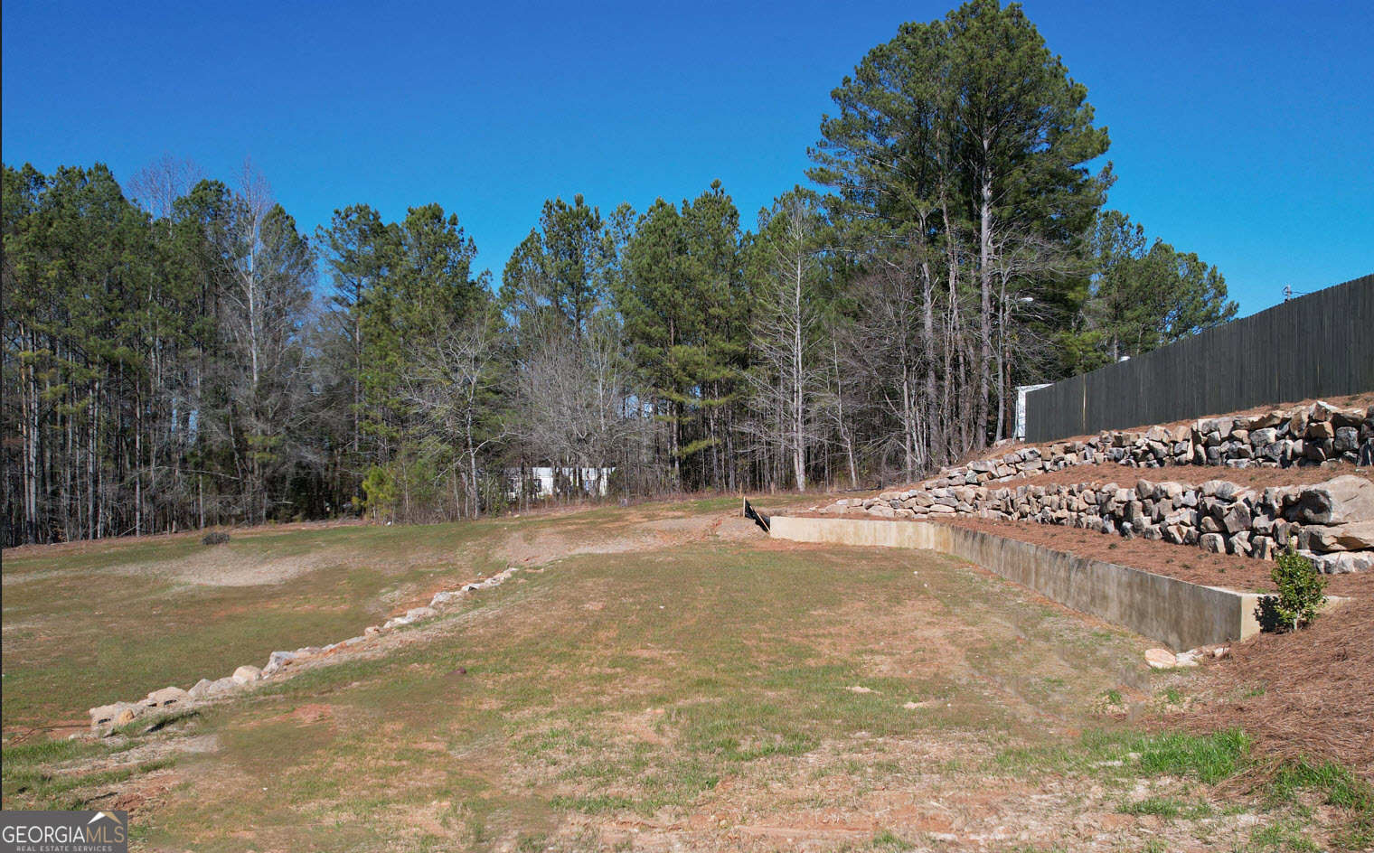 10 Rivers Edge Lane, Unit LOT 1 Franklin, GA 30217 - Photo 2 of 3 a view of a yard with tree s
