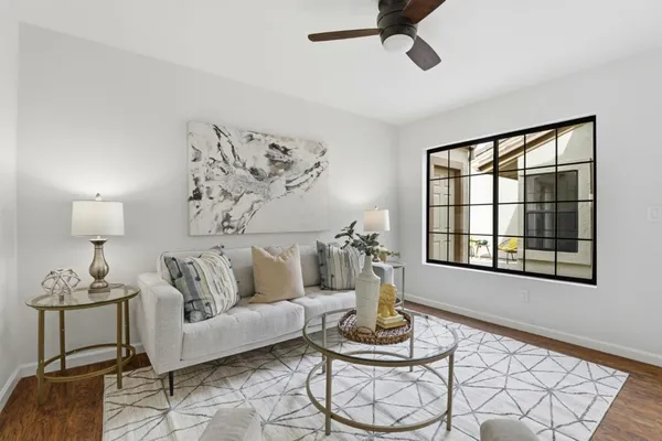 a living room with furniture and window