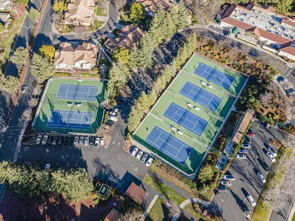 an aerial view of a house with a garden