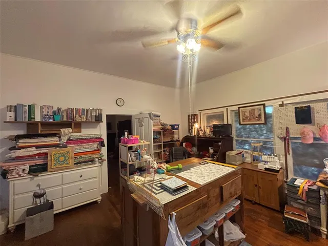 a view of a workspace with furniture