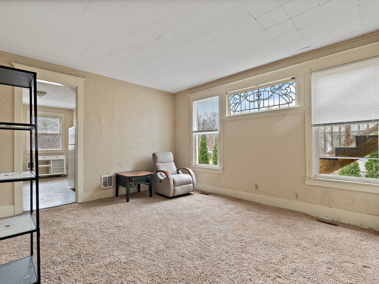 1546 12th Avenue Moline, IL 61265 - Photo 12 of 32 a living room with furniture and a window