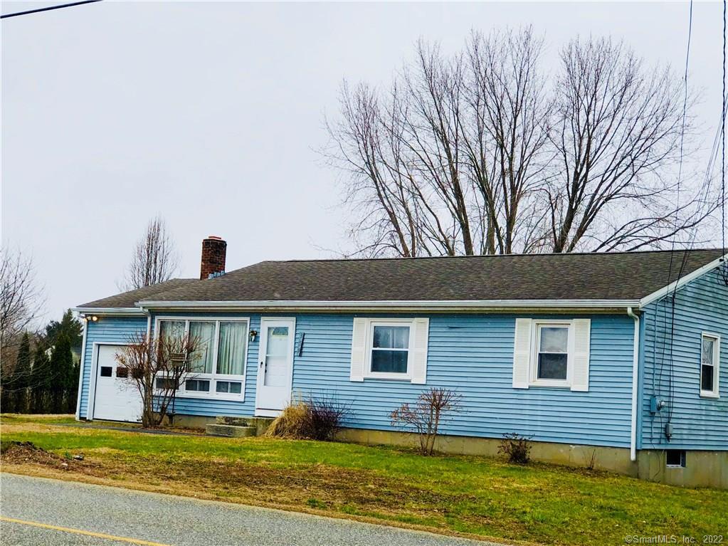 a view of a house with a swimming pool