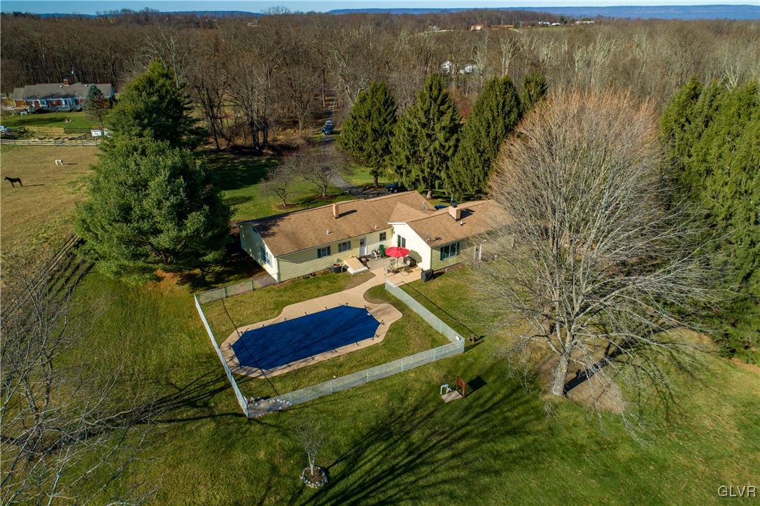 3 Koeck Road Columbia, NJ 07832 - Photo 3 of 23 a garden view with a lake