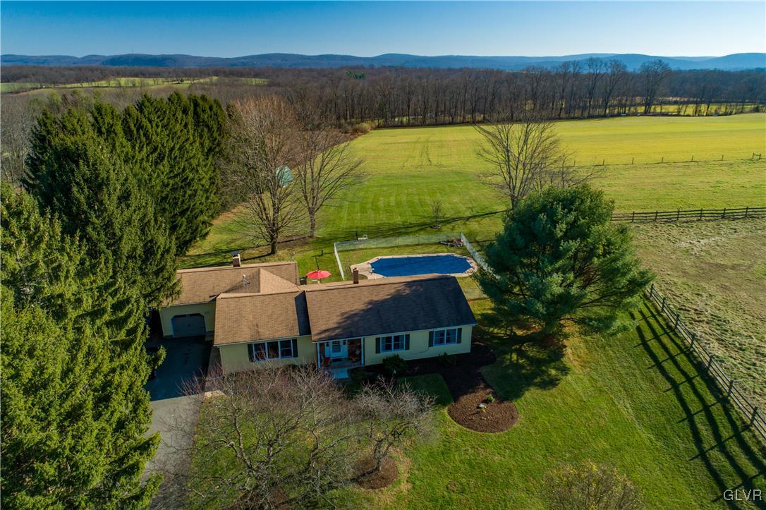 3 Koeck Road Columbia, NJ 07832 - Photo 4 of 23 a view of a swimming pool with a patio