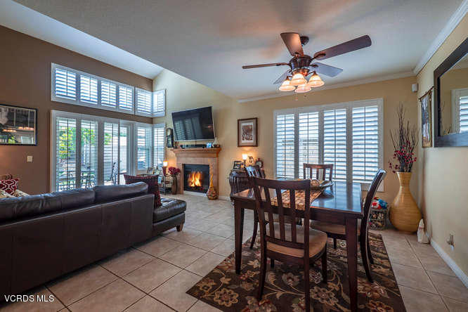 40 Valley Crest Road Simi Valley, CA 93065 - Photo 2 of 38 a living room with furniture a fireplace and a chandelier