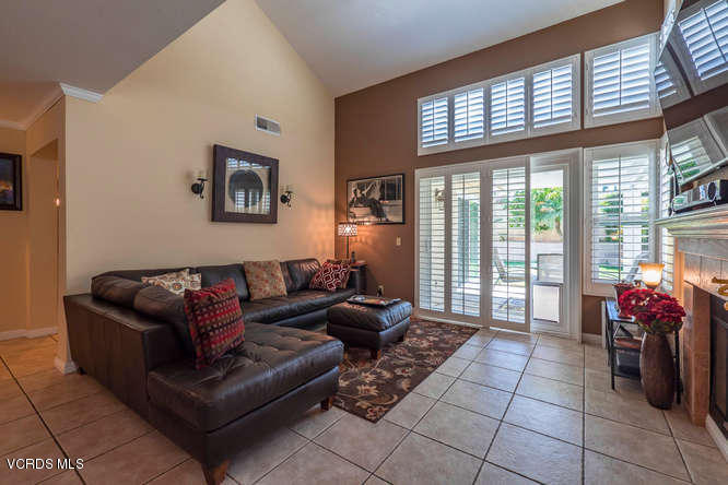 40 Valley Crest Road Simi Valley, CA 93065 - Photo 14 of 38 a living room with furniture and a floor to ceiling window
