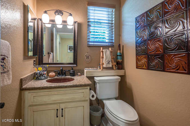40 Valley Crest Road Simi Valley, CA 93065 - Photo 27 of 38 a bathroom with a toilet sink and mirror
