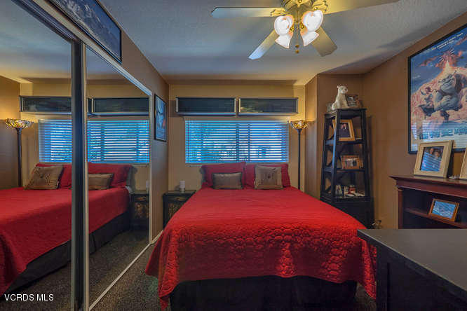 40 Valley Crest Road Simi Valley, CA 93065 - Photo 35 of 38 a bedroom with a bed and large closet