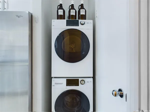 a view of washer and dryer in a utility room