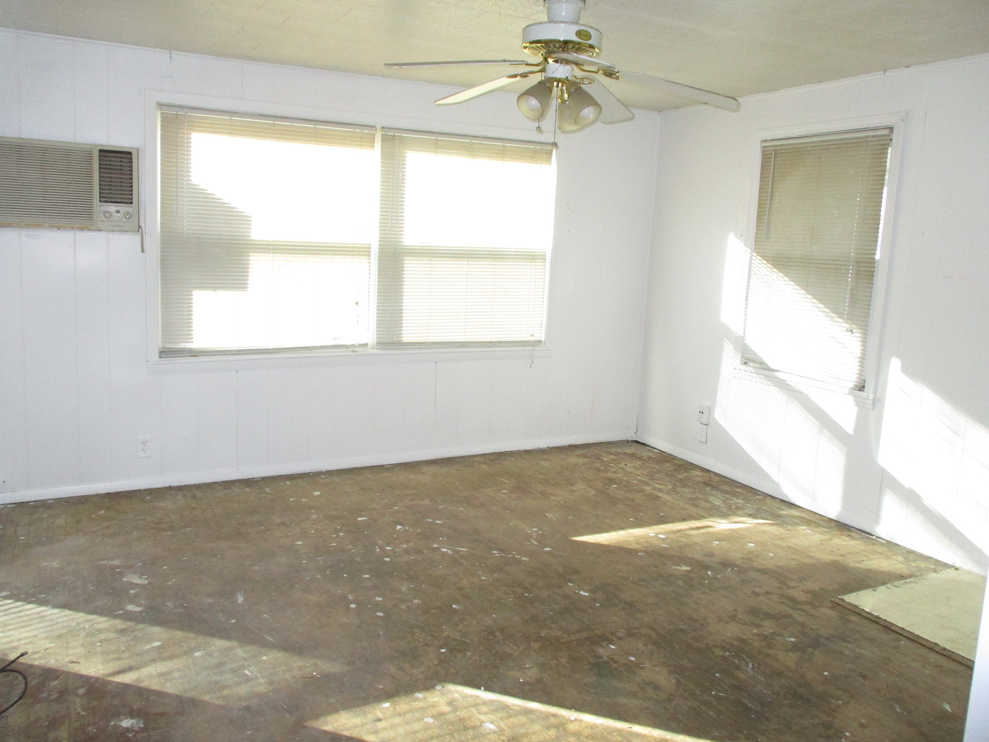 1213 North Main Street Georgetown, IL 61846 - Photo 3 of 9 a view of an empty room and window