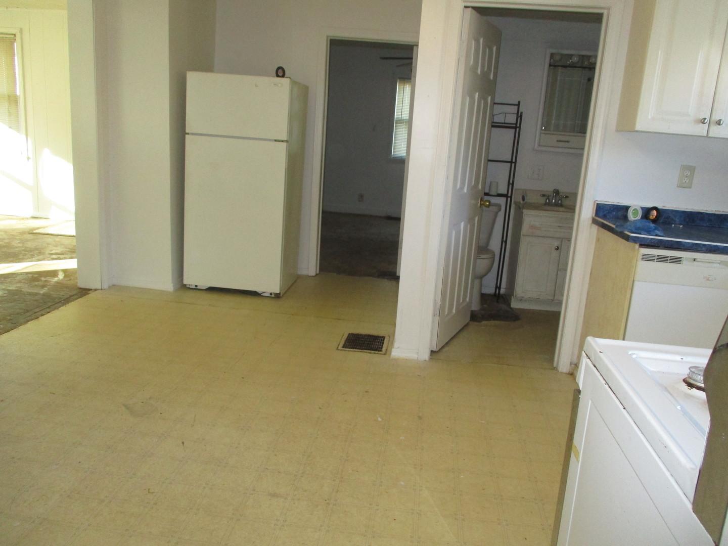 1213 North Main Street Georgetown, IL 61846 - Photo 6 of 9 a view of a storage & utility room with refrigerator