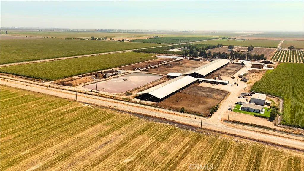 0 Oak Merced, CA 95341 - Photo 4 of 13 an aerial view of residential houses with outdoor space