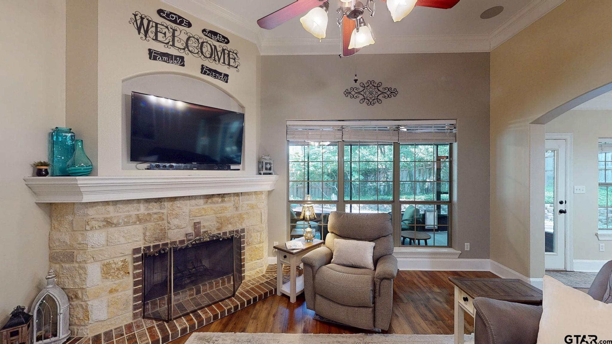 18488 Bluebird Circle Flint, TX 75762 - Photo 7 of 47 a living room with furniture and a fireplace