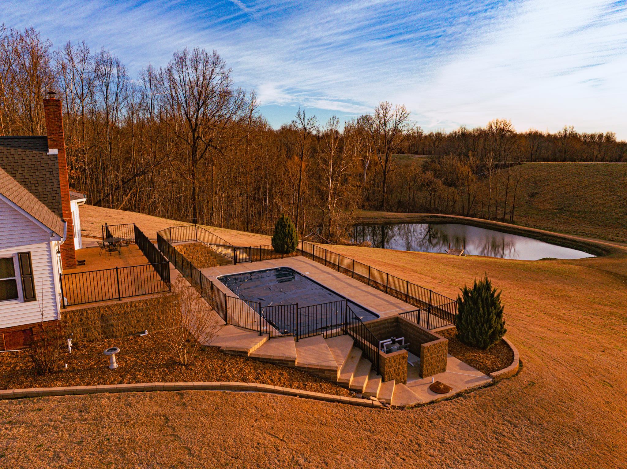 5030 Rogers Marshall Road Union City, TN 38261 - Photo 8 of 40 a view of swimming pool with seating area and trees around