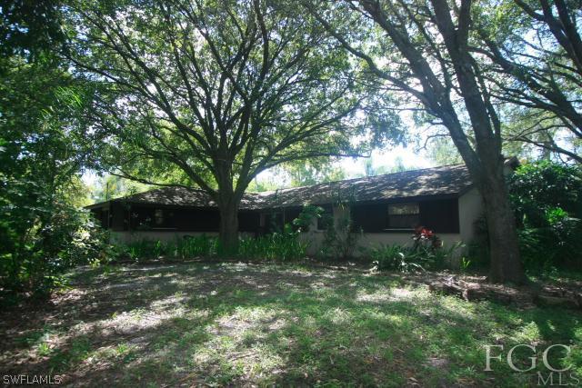 13901 Rod And Gun Club Road Fort Myers, FL 33913 - Photo 3 of 25 a view of a backyard
