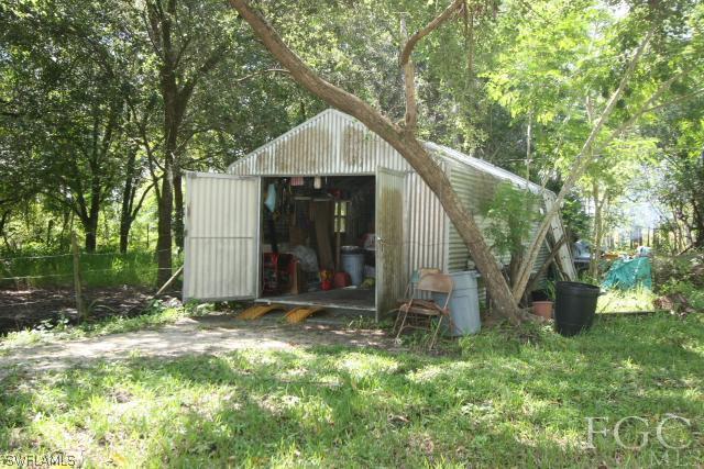 13901 Rod And Gun Club Road Fort Myers, FL 33913 - Photo 5 of 25 a view of a small house