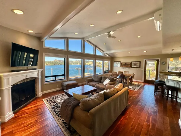a view of a balcony with two chairs