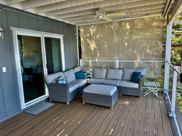 a bedroom with a bed window and a desk