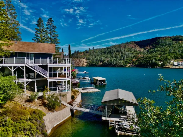 a living room with furniture fireplace and a flat screen tv
