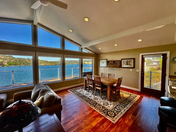 a living room with furniture fireplace and flat screen tv