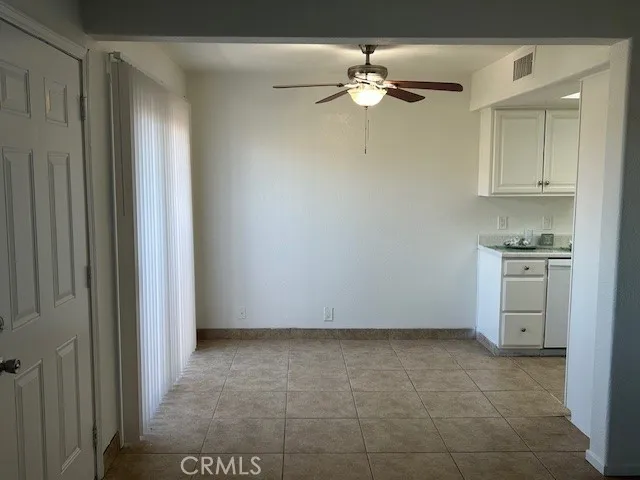 a view of kitchen and closet area